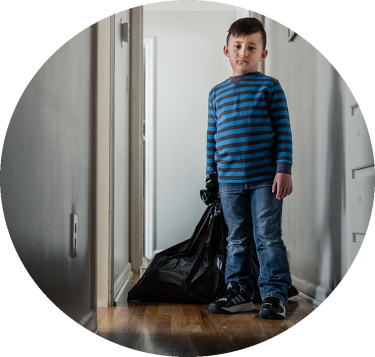 foster child with bag of clothes